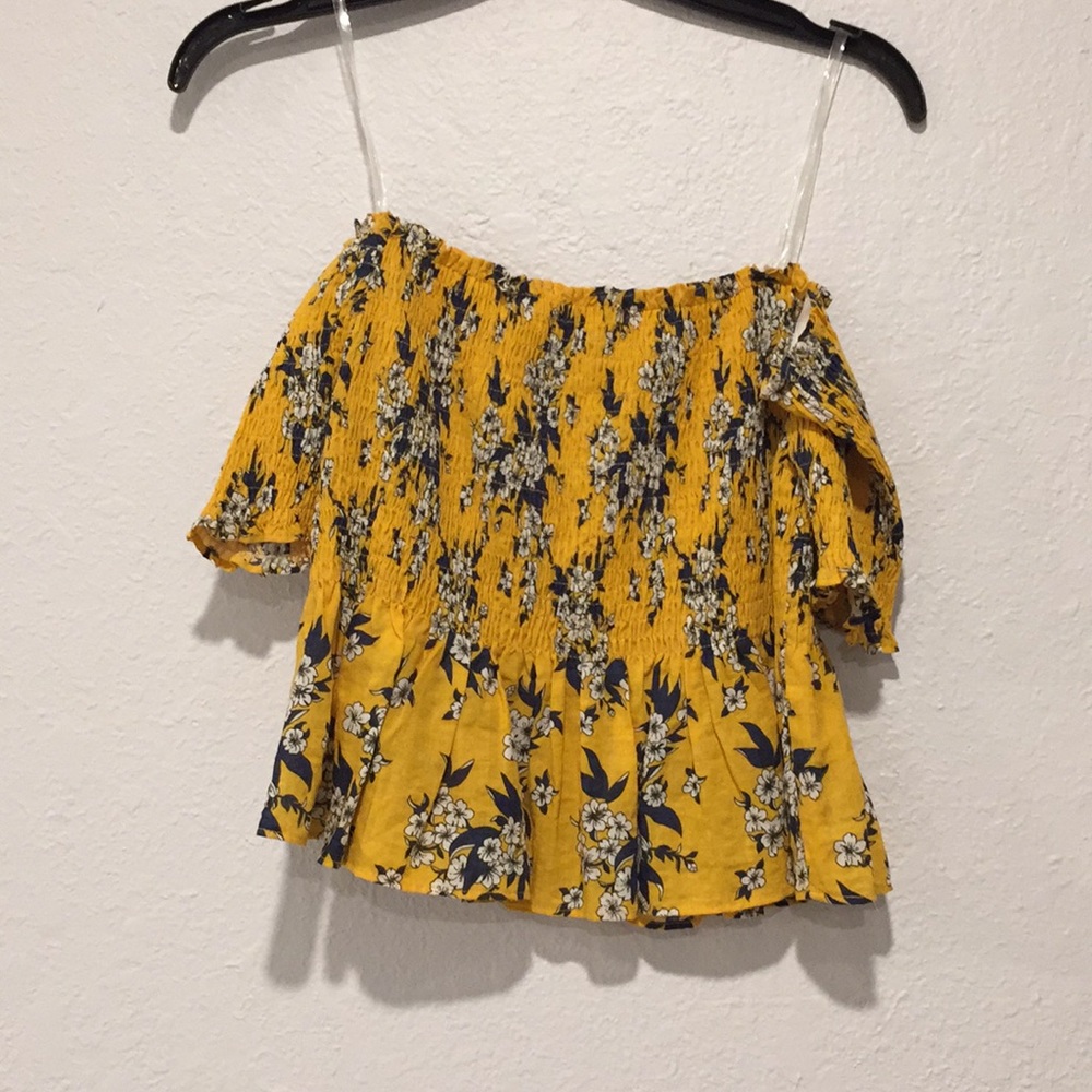 Off the shoulders yellow with blue flowers.